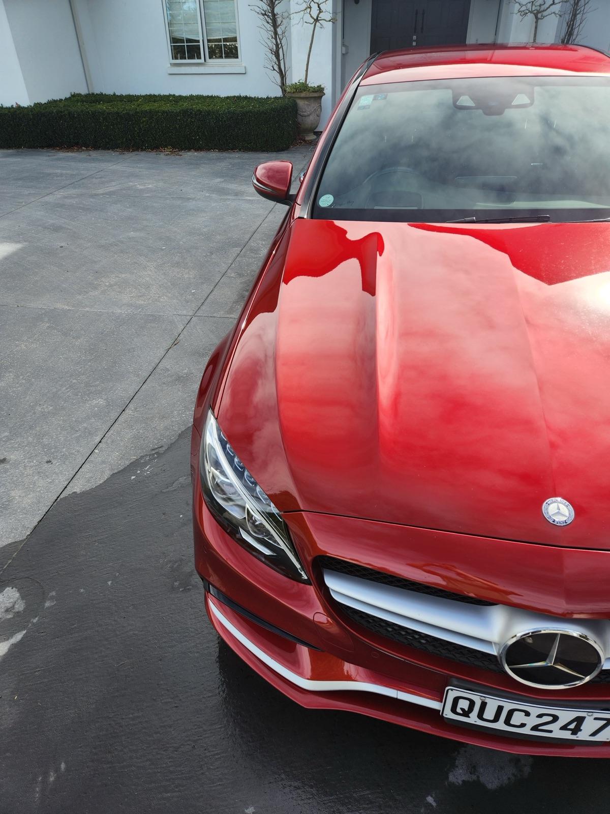 Red Mercedes after two-stage exterior paint correction by Deluxe Detailing, mobile car detailing North Canterbury